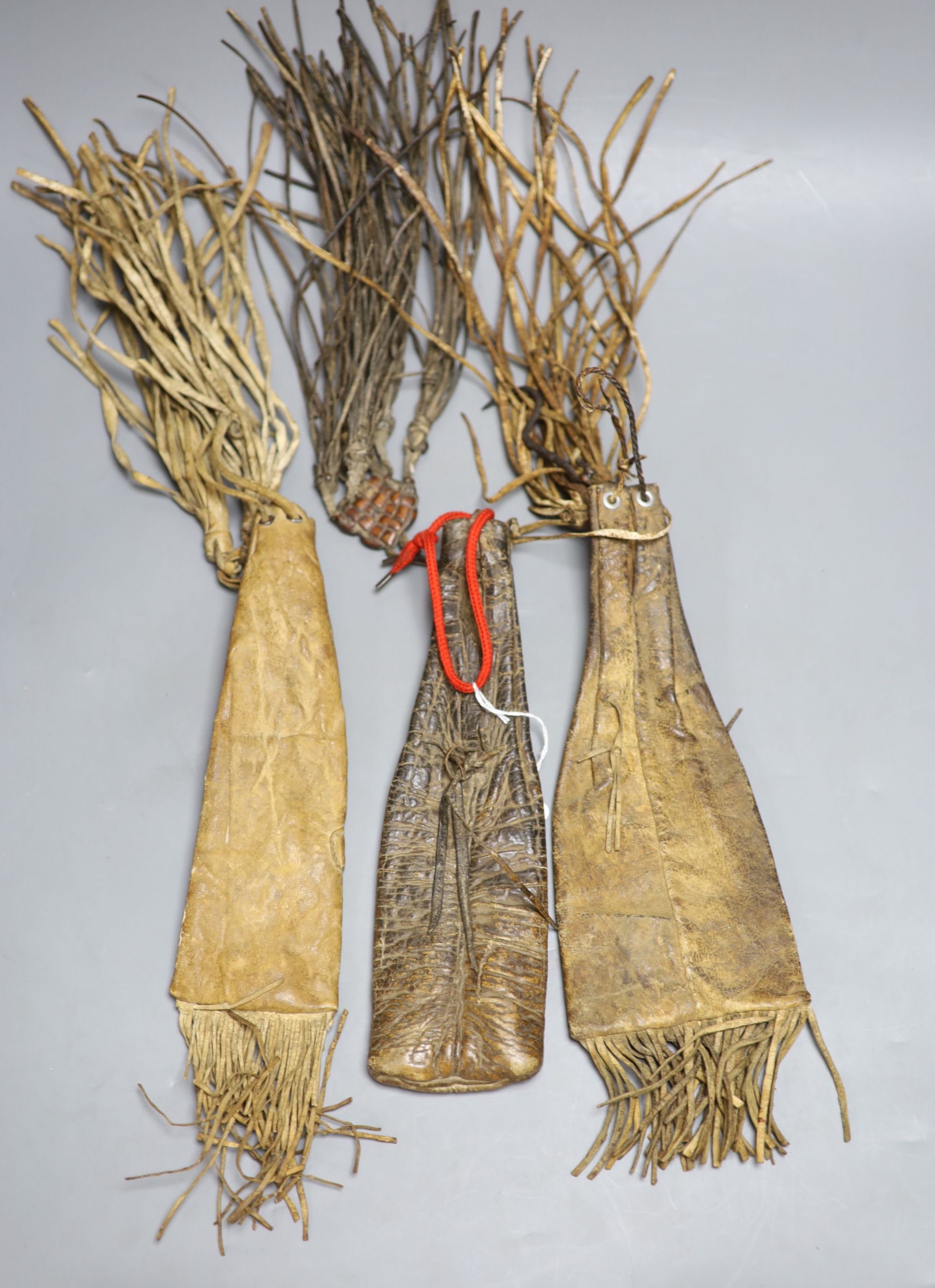 Three animal hide pouches, possibly Mongolian